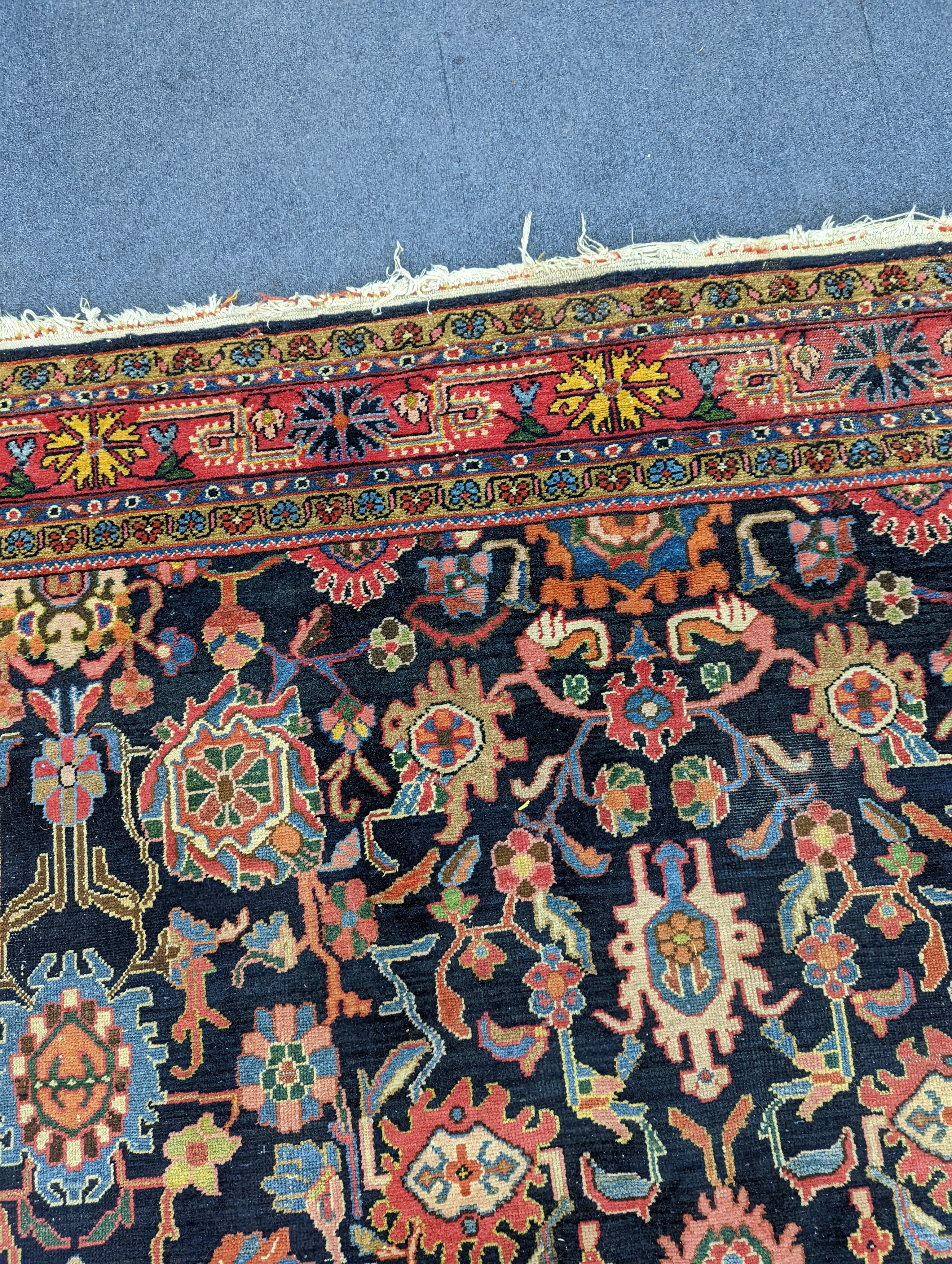 A Heriz / Moghal blue ground carpet, 340 x 206cm
